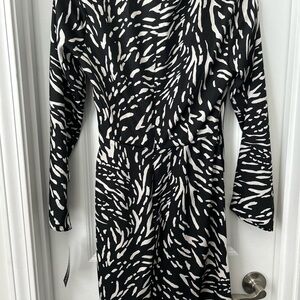 Donna Morgan Black and White Asymmetrical Wrap Dress with Bell Sleeves